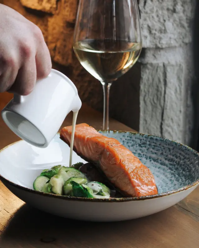 Some plates just feel like home.

Pan-Seared Scottish Organic Salmon with Dijon cream, roasted potatoes, and seasonal vegetables is winter dining done right.

Make it part of your next HEIST night.